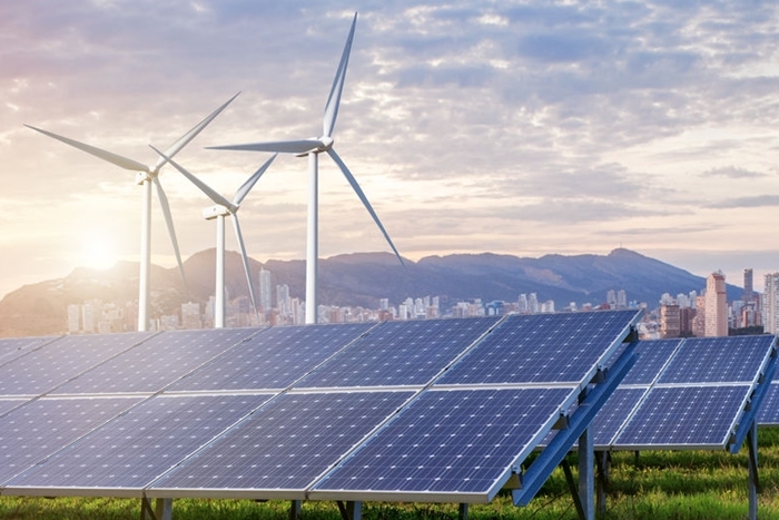 Solar panels and wind turbines with city